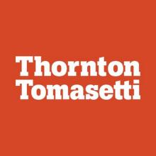 Orange background with white font writing "Thornton Tomasetti"