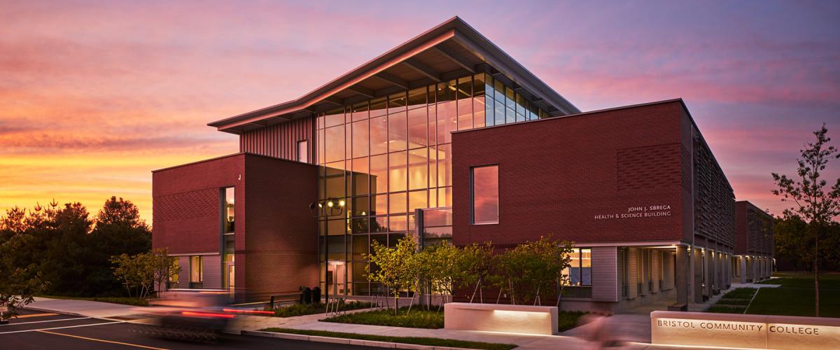 Bristol Community College Sbrega Health & Science Building exterior at dusk