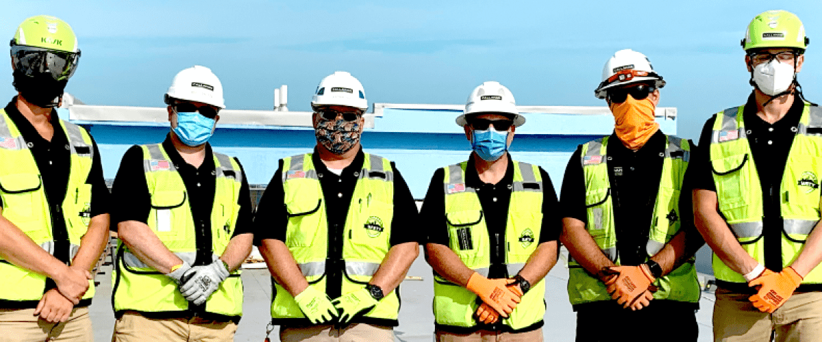 Group of uniformed Callahan Construction Manager employees