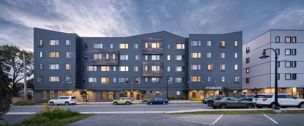 An image, taken at dusk, of the West End Apartments in South Portland, Maine.