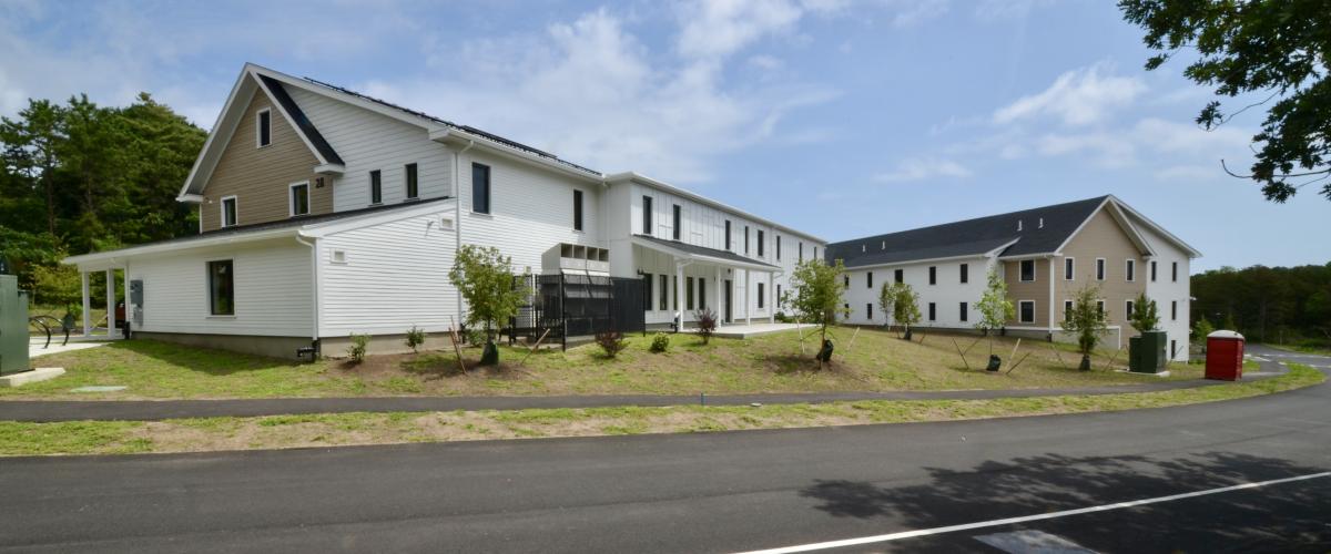 LeClair village is a 3 and four story wood framed, pitched roof affordable housing building complex