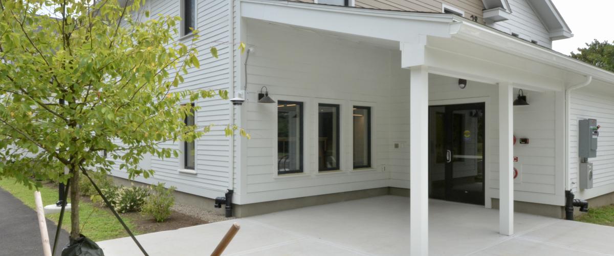 Front entry porch in white clapboard