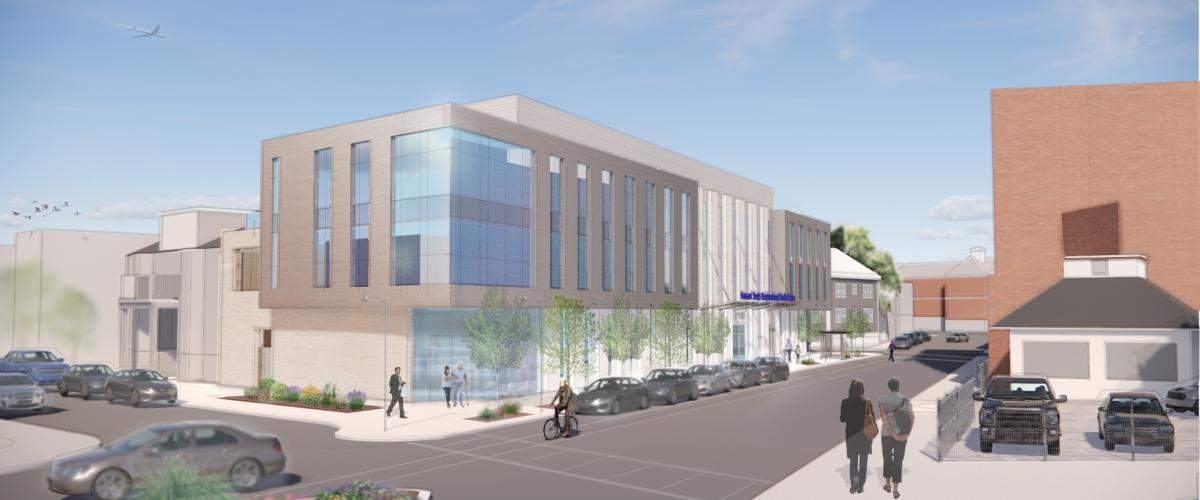 Rendering of the healthcare facility situated in a mixed-use neighborhood.