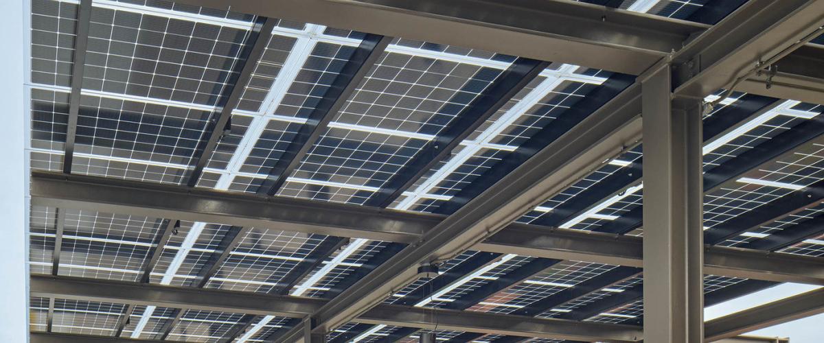 Outdoor covered solar panel pathway at Keeney Elementary School