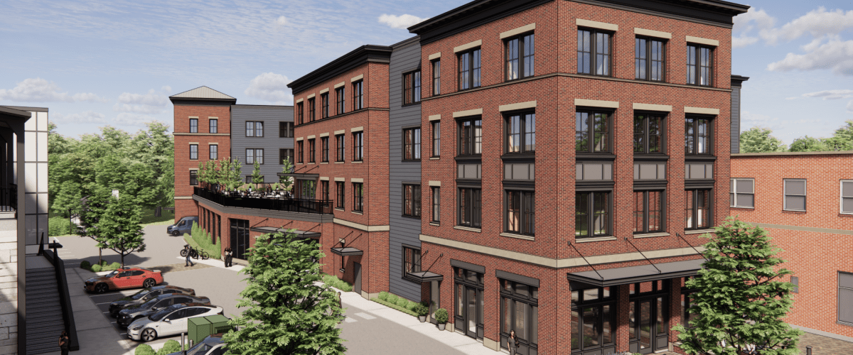 Architectural rendering of the proposed Waterfield Lot Winchester affordable multifamily residential development, showing the five-story building from a street-level perspective.
