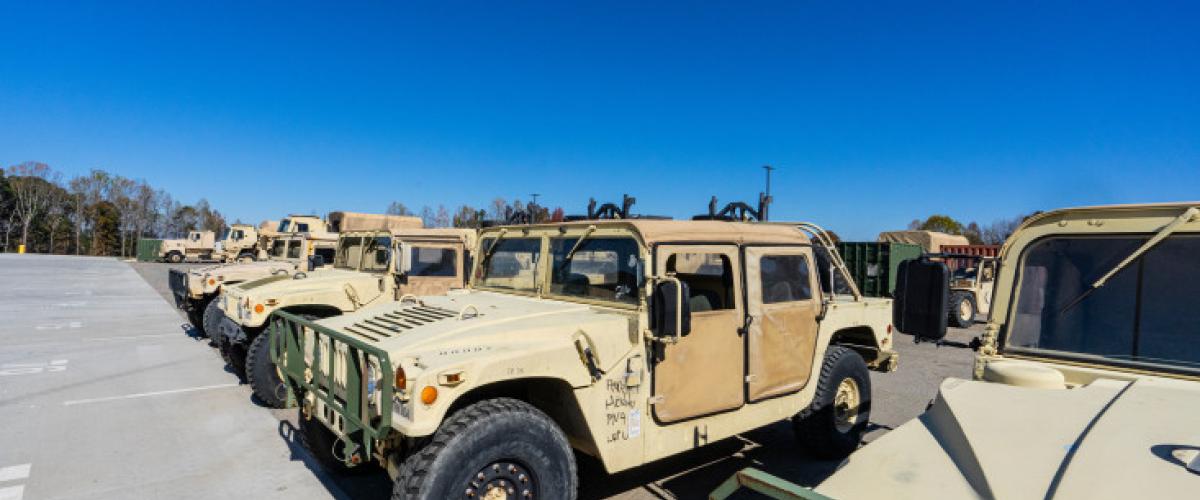 Army vehicles lined up outside Burlington Field Maintenance Shop