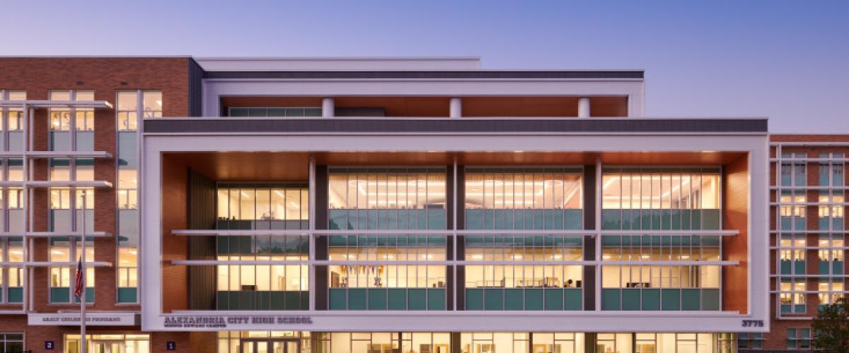 Frontal view of Minnie Howard Campus at dusk