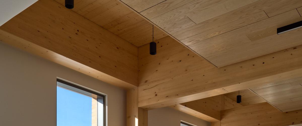 Timber frame construction visible on the interior of the building.