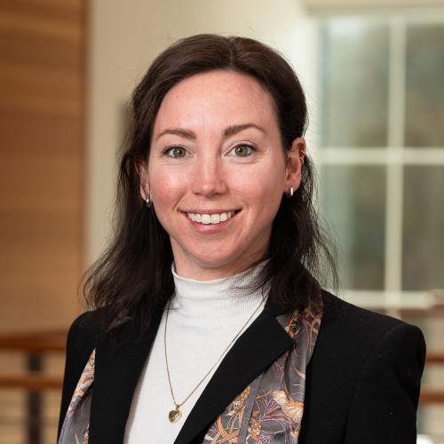 Female with brown hair in blazer