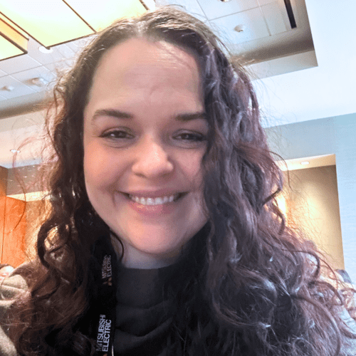 Woman with brown hair smiling