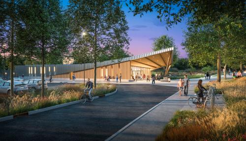 Exterior rendering of the Danehy Gateway Pavilion building at twilight with people on bicycles, in wheelchairs, walking and sitting around the building exterior.