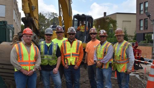 Bond Brothers employees standing together