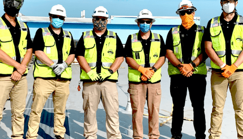 Group of uniformed Callahan Construction Manager employees