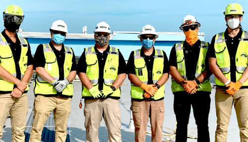 Group of uniformed Callahan Construction Manager employees