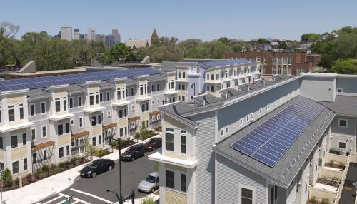 Aerial view of a newly-constructed neighborhood consisting of townhomes