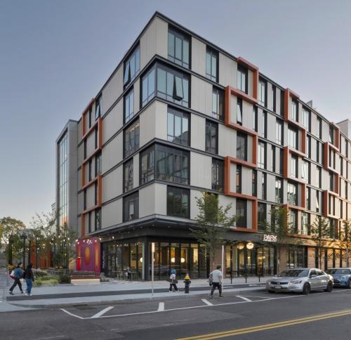 Street view of 280 Western Ave at sunset