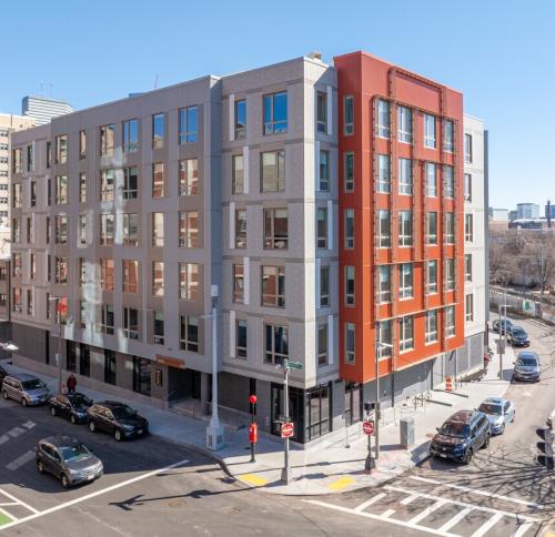 Image of completed Pok Oi residences housing building