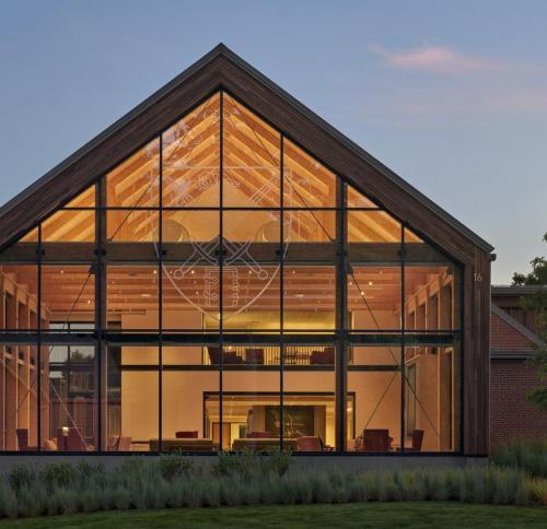 Completed admissions center at St. Paul's school at dusk.