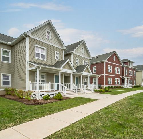 Sidewalk view of two Willow Street rental houses