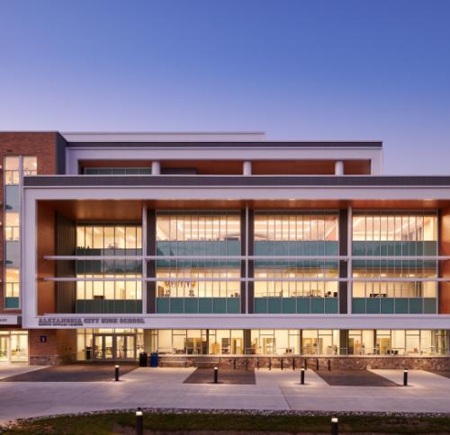 Frontal view of Minnie Howard Campus at dusk